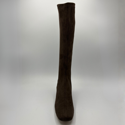 Front view of a brown suede tall boot with a wrapped heel