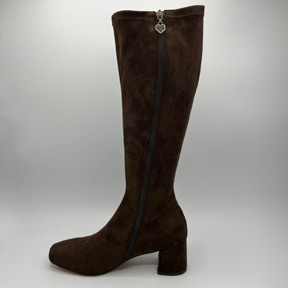 Left facing view of a brown suede tall boot with a wrapped heel