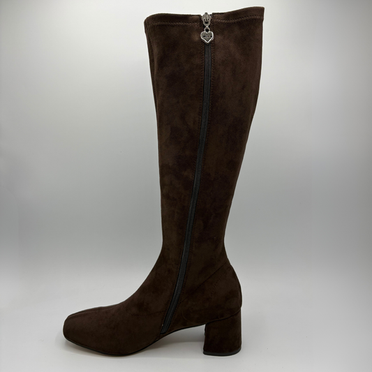 Left facing view of a brown suede tall boot with a wrapped heel