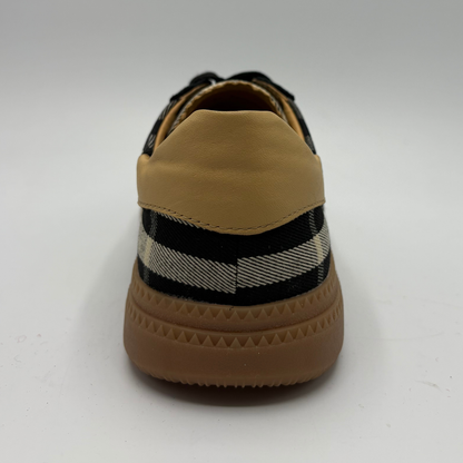 Back facing view of a plaid sneaker with a gum outsole