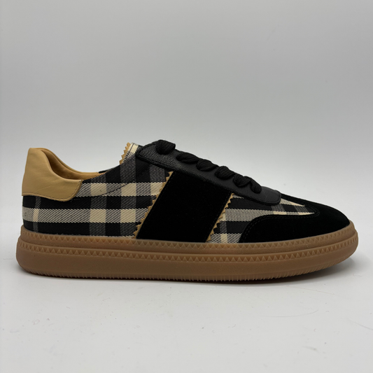 Right facing view of a plaid sneaker with a gum outsole
