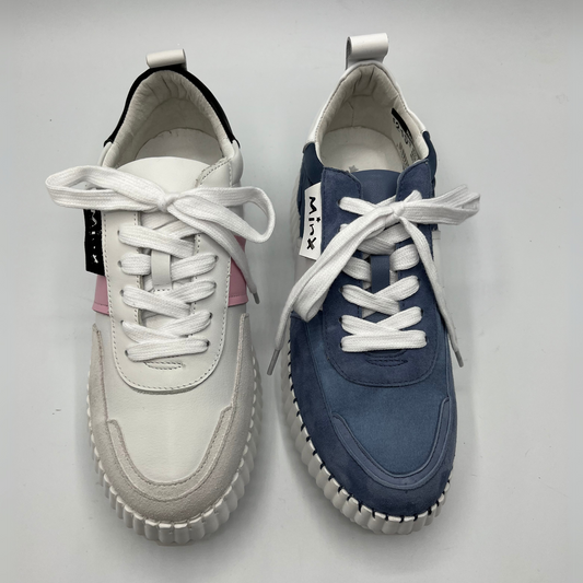 Top view of a two suede sneakers with a white rubber platform outsole. One is white and pink and the other is denim and white.