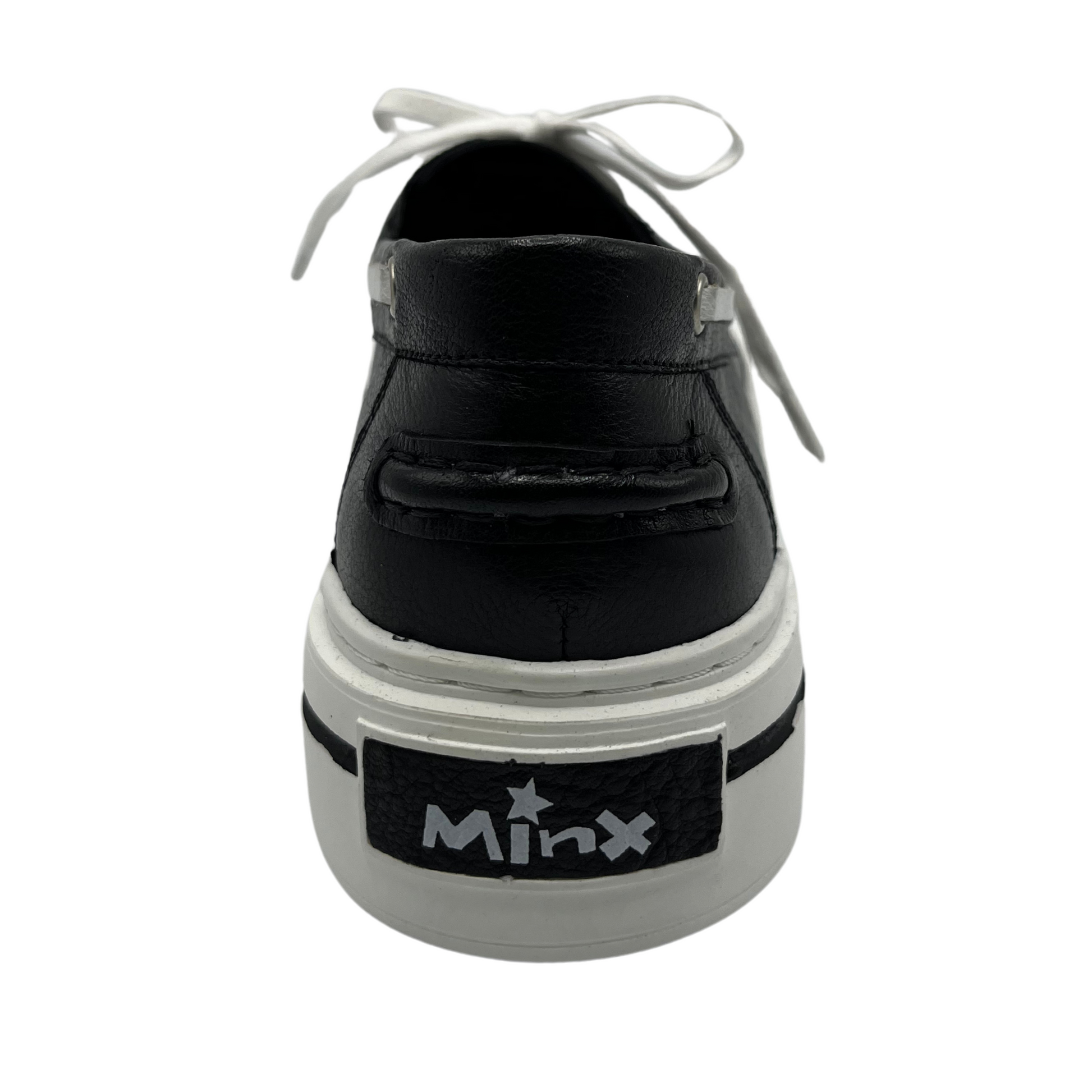 Back view of a black leather boat shoe with white rubber platform outsole and white laces