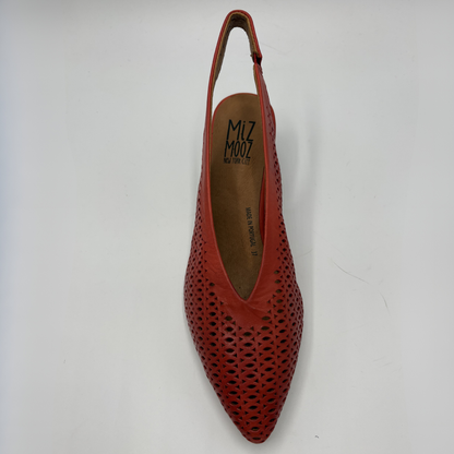 Red perforated shoe with 'Miz Mooz' branding on a white background