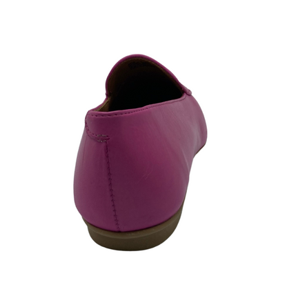 Back view of fuchsia leather flat shoe with 1/2 inch heel 
