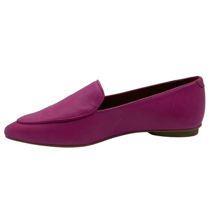 Left facing view of pink leather pointed toe flat with 1/2 inch heel