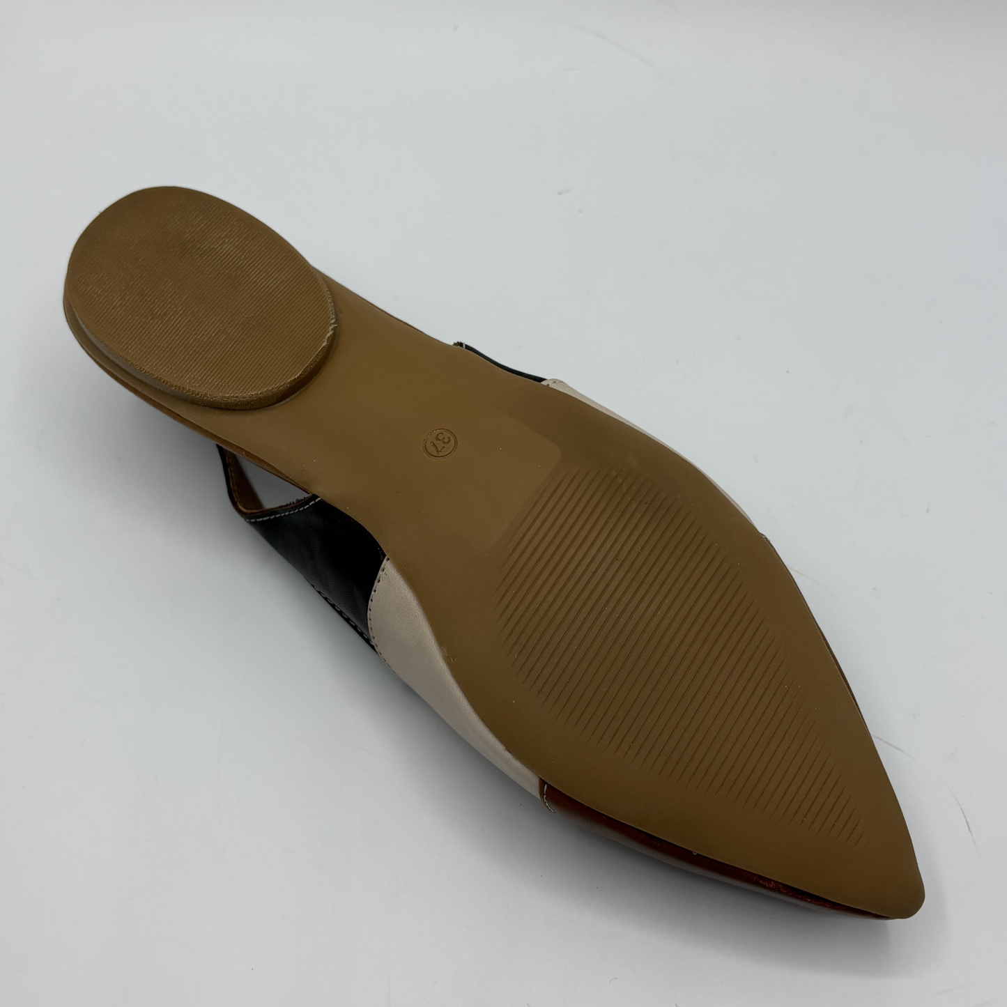 Brown shoe sole on a white background