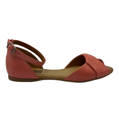 Right facing view of pink leather ballet flat sandal with buckle ankle strap and peep toe.