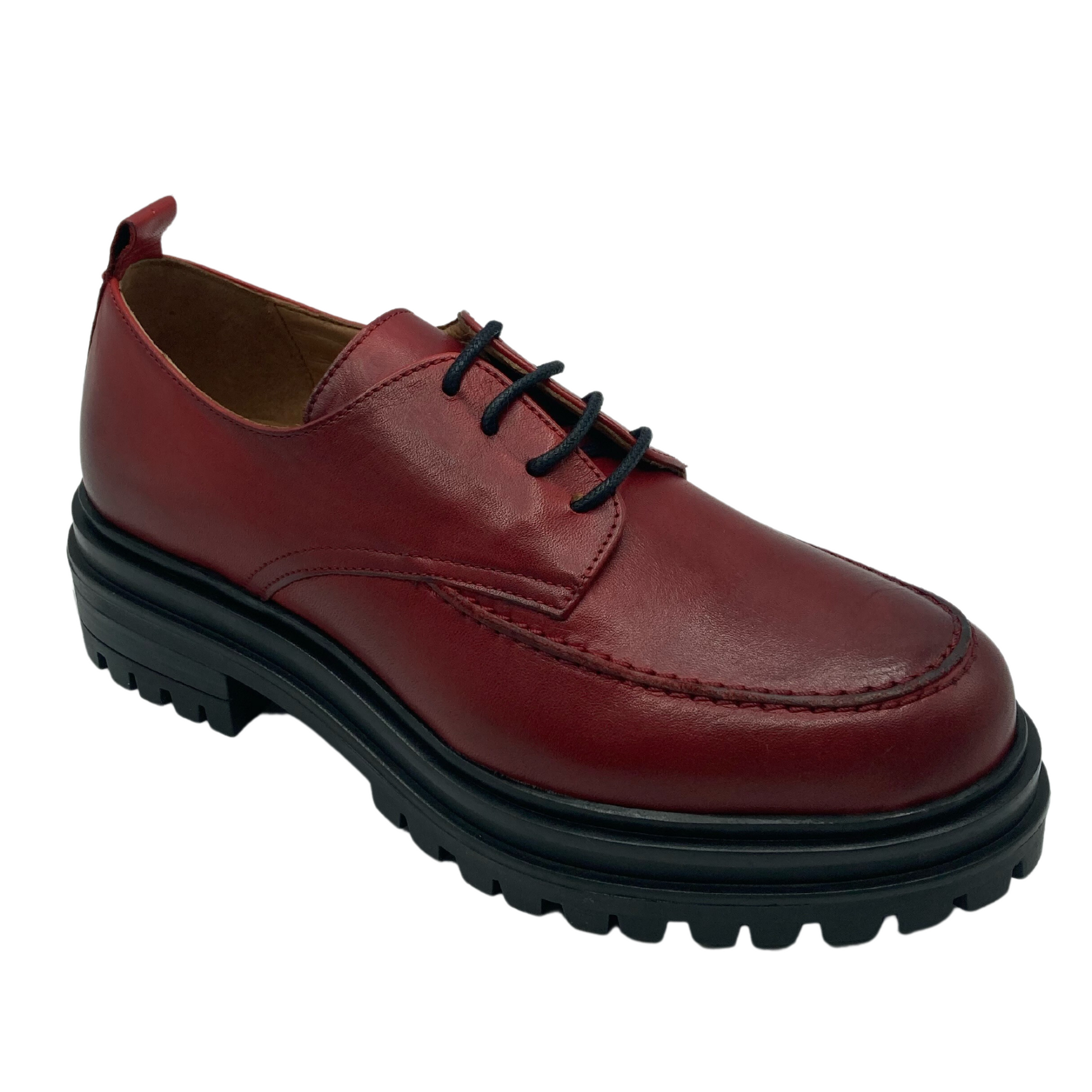 45 degree angled view of red leather loafer with black rubber sole and skinny black laces