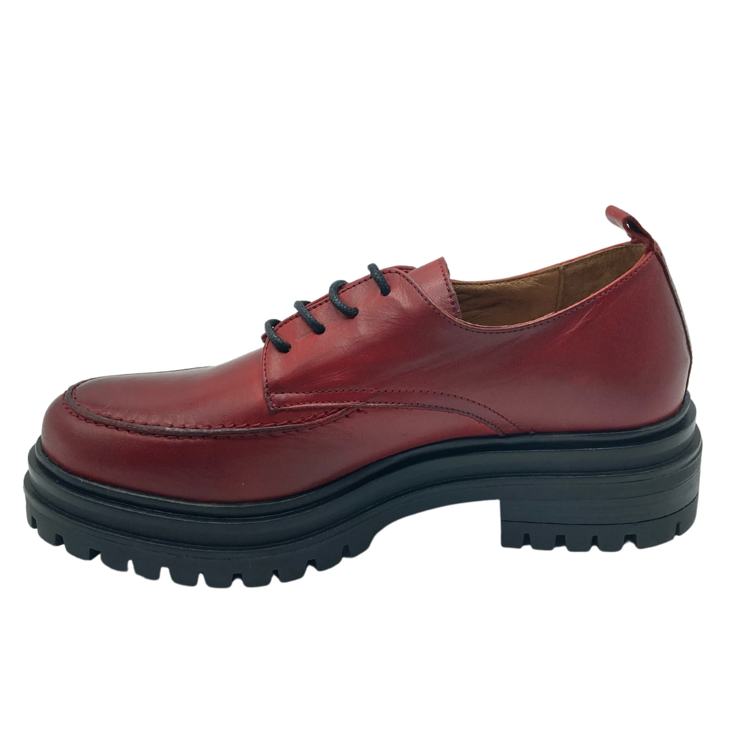 Left facing view of red leather loafer with skinny black laces, heel pull-on tab and chunky black sole