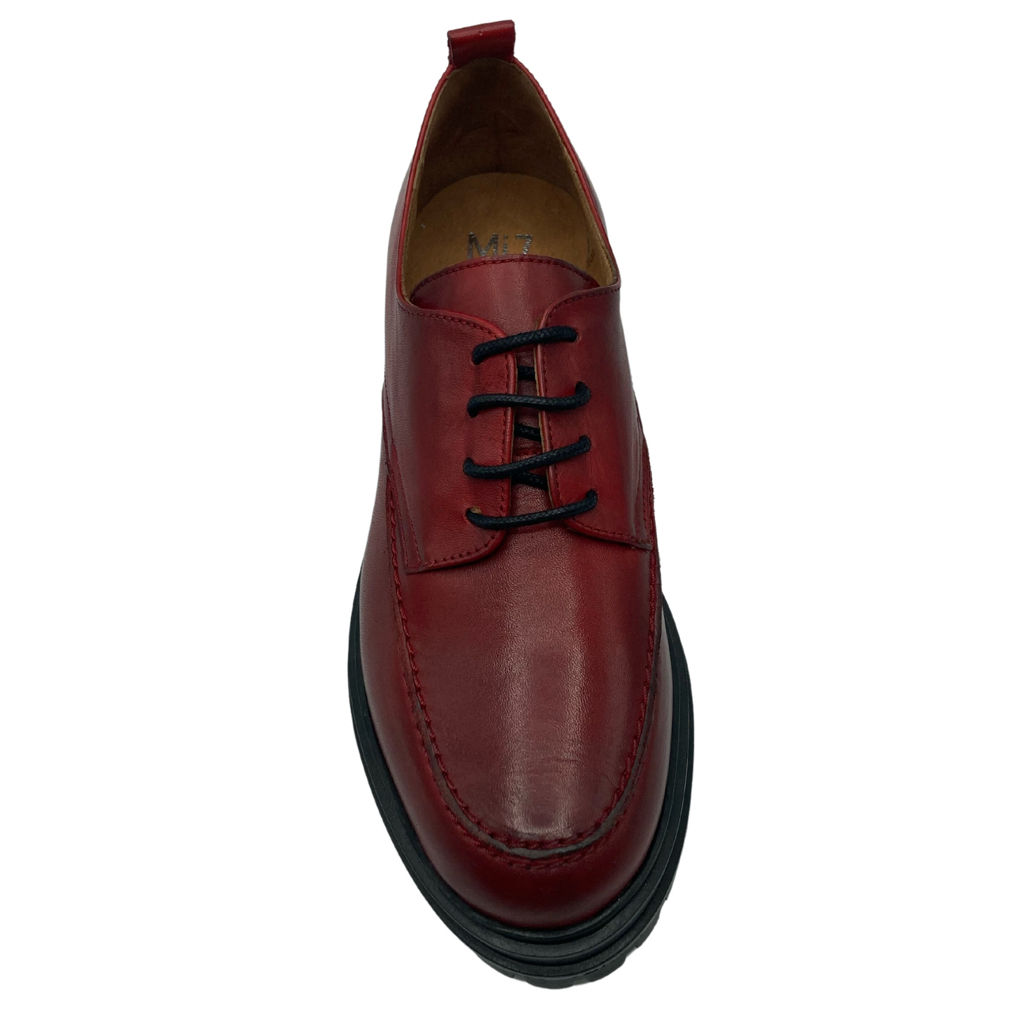Top view of rounded toe, red, leather loafer with skinny black laces and tan coloured insole