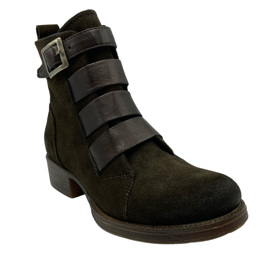 45 degree angled view of chocolate brown suede leather ankle boot with four strap detail on upper and block heel