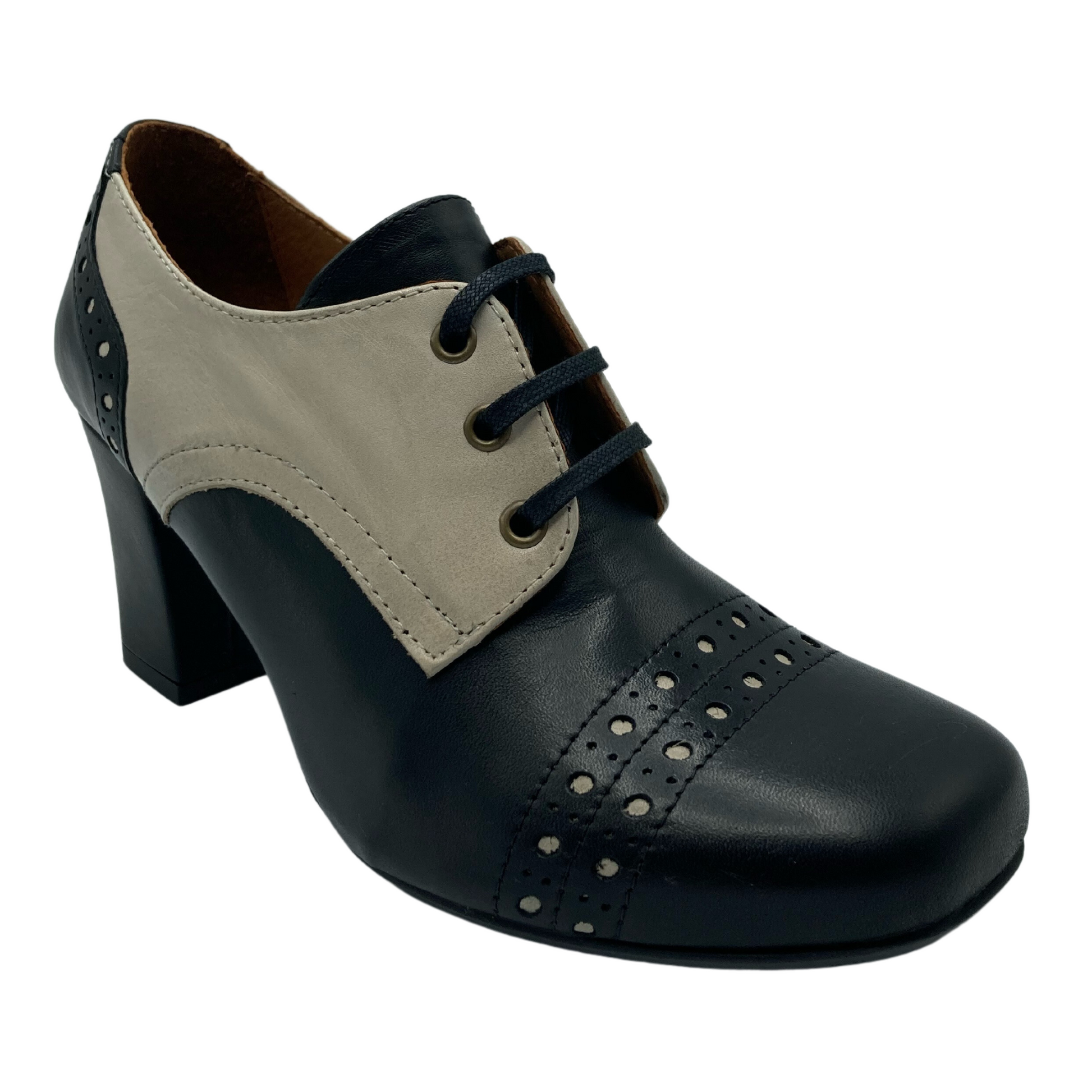 45 degree angled view of leather oxford with block heel and black laces