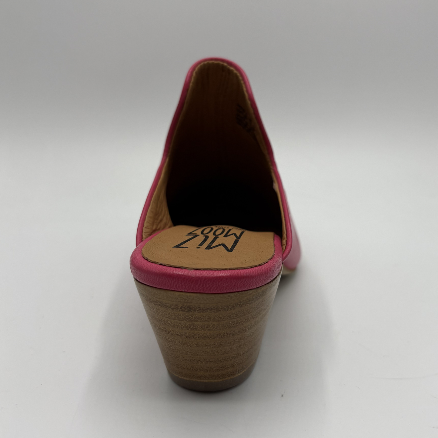 Pink high-heeled shoe with a visible brand name on a white background