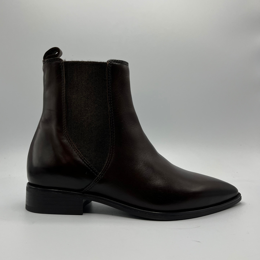 Chestnut leather Chelsea boot on a light gray background