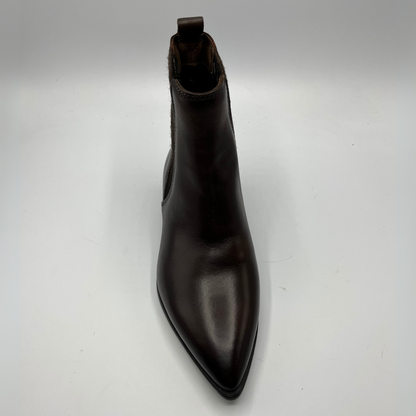 Black leather boot on a white background