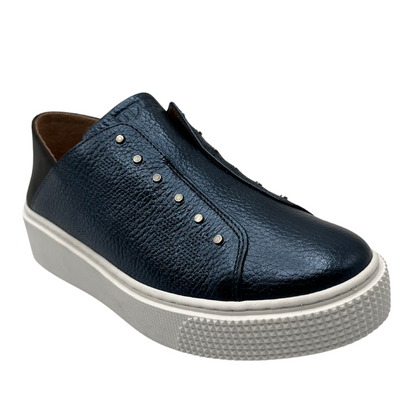 45 degree angled view of navy coloured sneaker with black heel cap and white rubber outsole