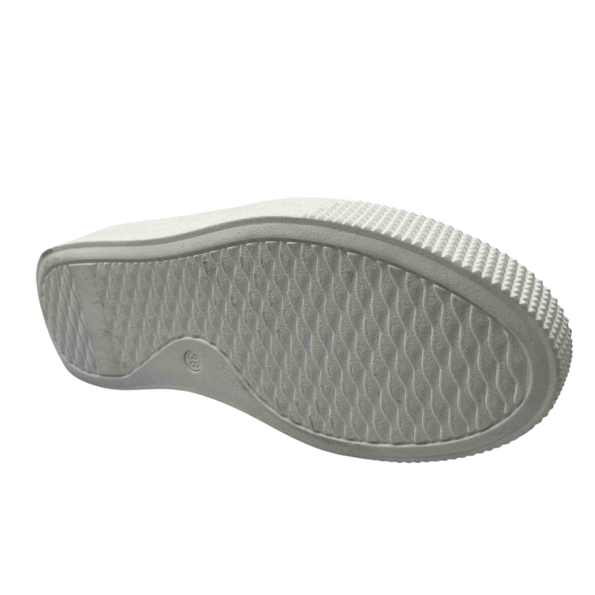 Bottom view of leather sneaker with white rubber outsole