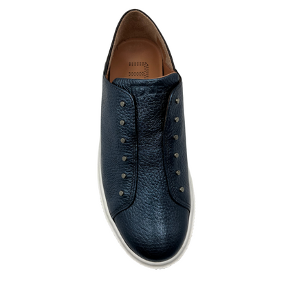Top view of navy leather sneaker with rounded toe and white rubber outsole
