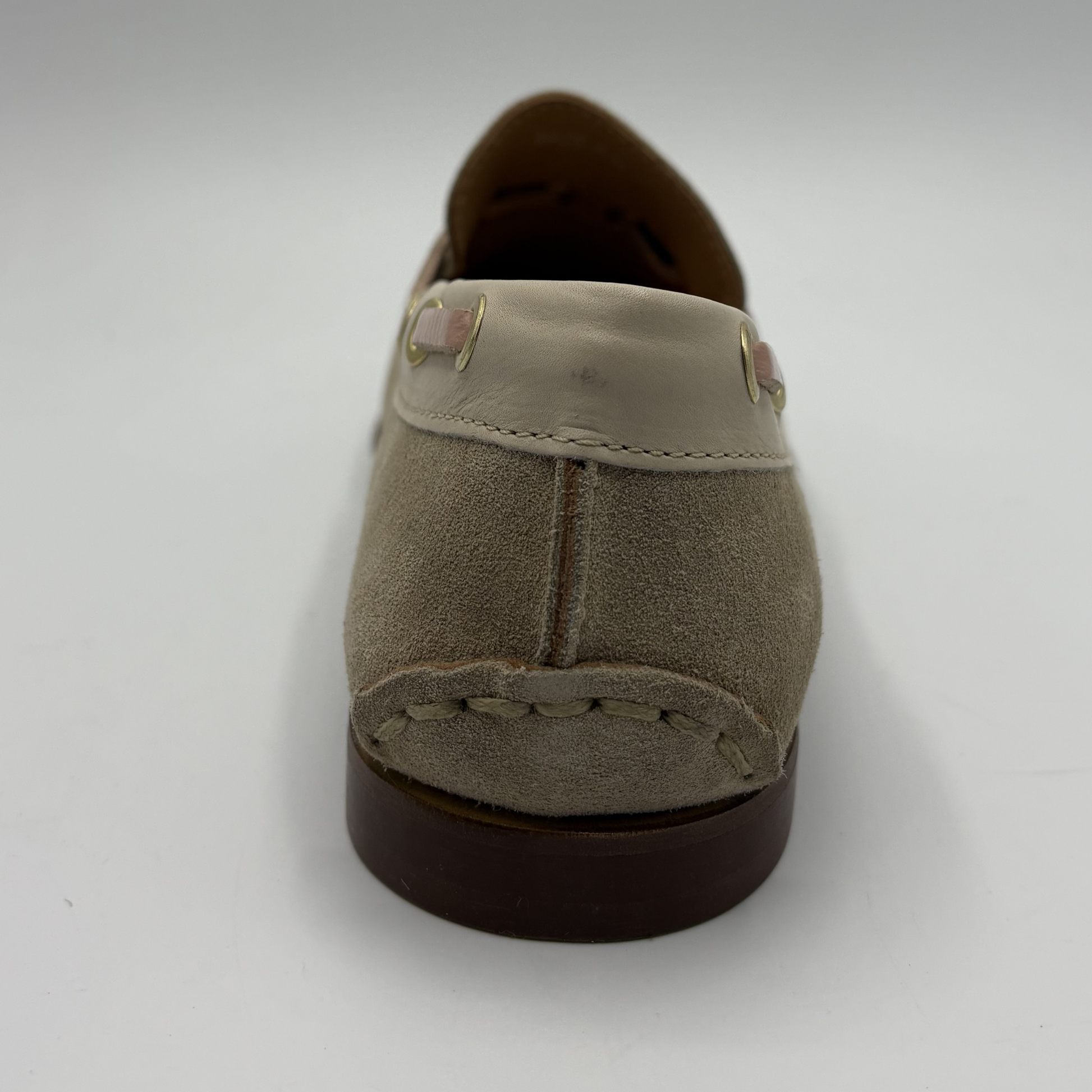 Brown loafer shoe on a white background
