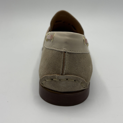 Brown loafer shoe on a white background