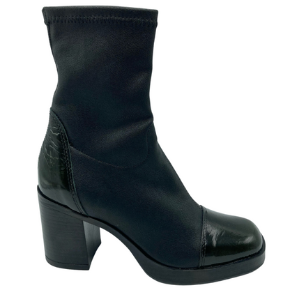 Side view of black leather calf boot with glossy leather toe and heel cap