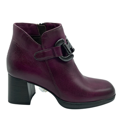 Side view of purple leather ankle boot with chunky black heel