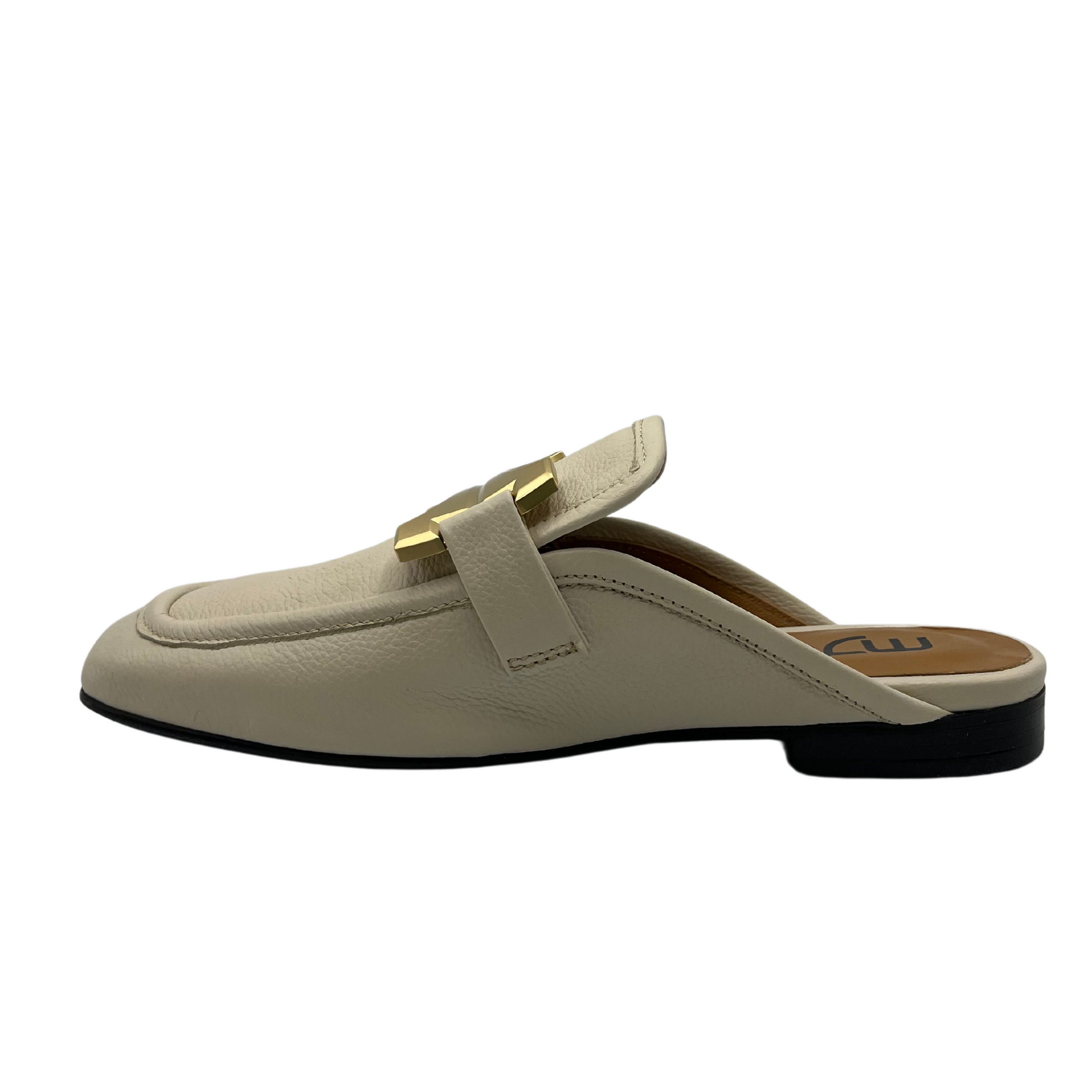 Left facing view of latte leather slip on loafer with short block heel