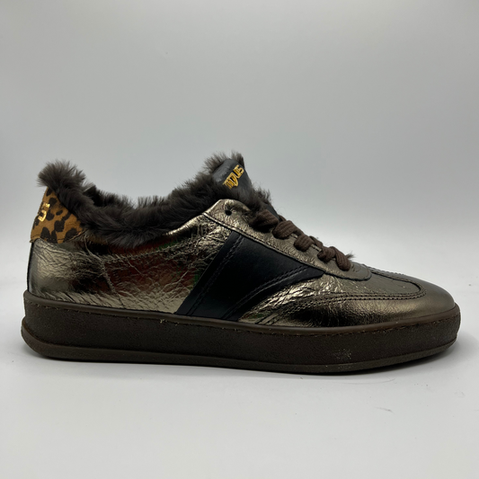 Bronze sneaker with a dark fur lining on a gray background