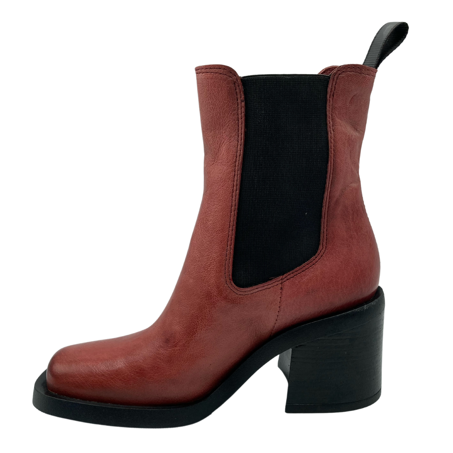 Left facing view of red/orange chunky heeled boot with black sole
