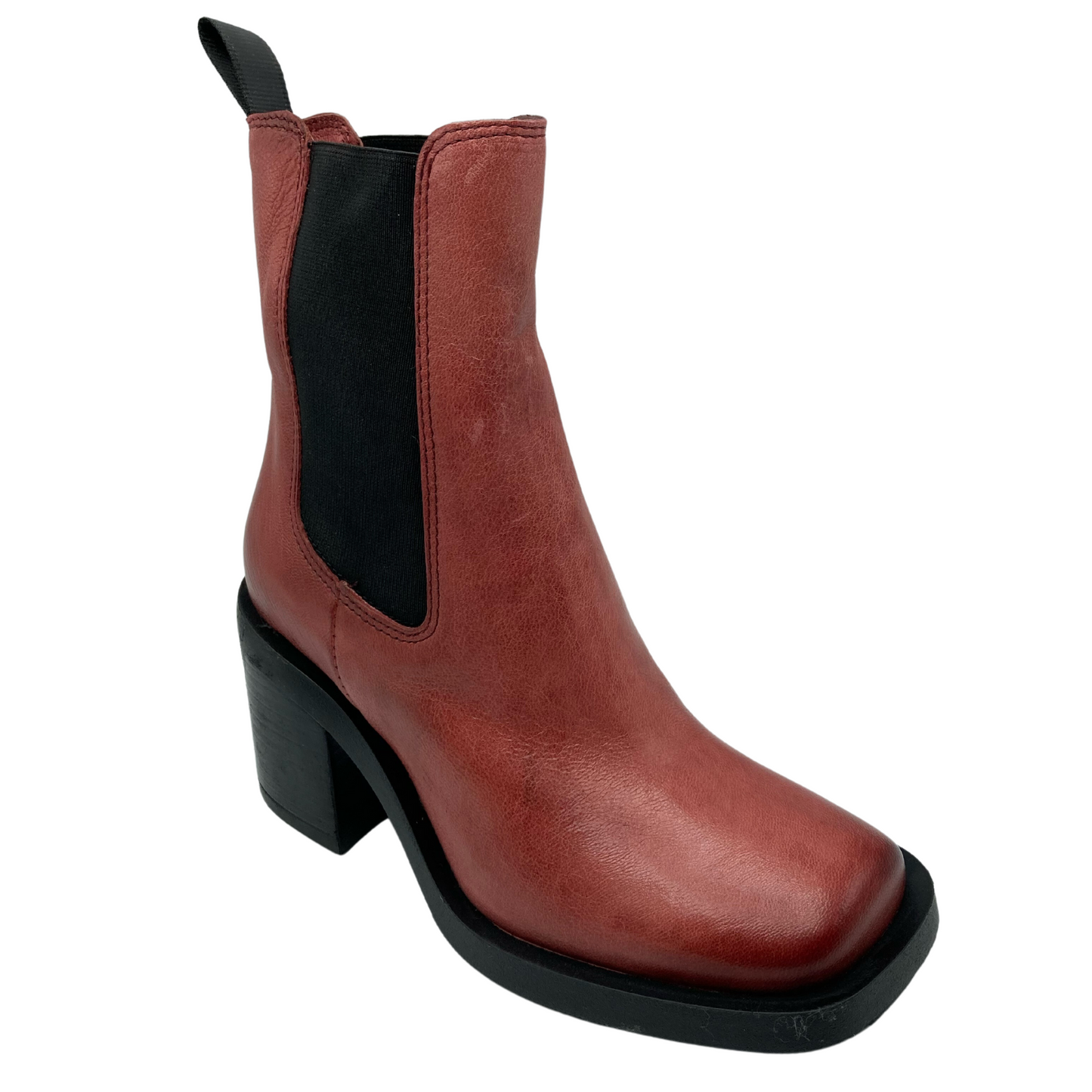 Angled view of mid-calf height boot with black elasticated sides and black pull on tab