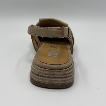 Brown sandal with a strap on a white background