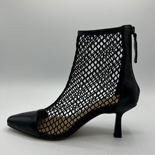 Left facing view of a black mesh heeled boot