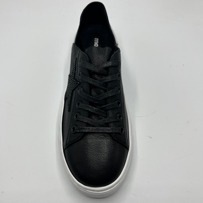 Top view of a black leather sneaker with a black bejewelled star