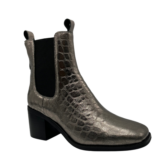 45 degree angled view of pewter croc leather short boot with elastic side gores, double pull on tabs and block heel