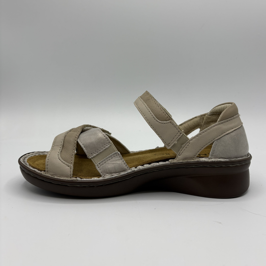 Left view of a taupe sandal