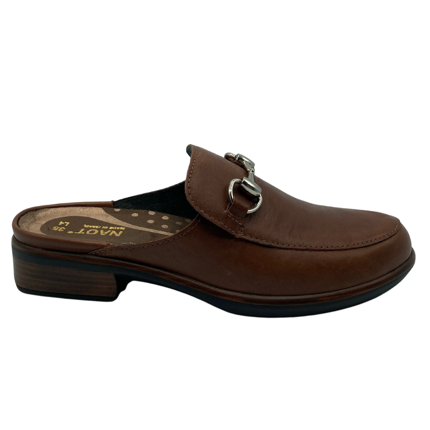 Right facing view of brown leather slide loafer with block heel and silver bit detail on upper