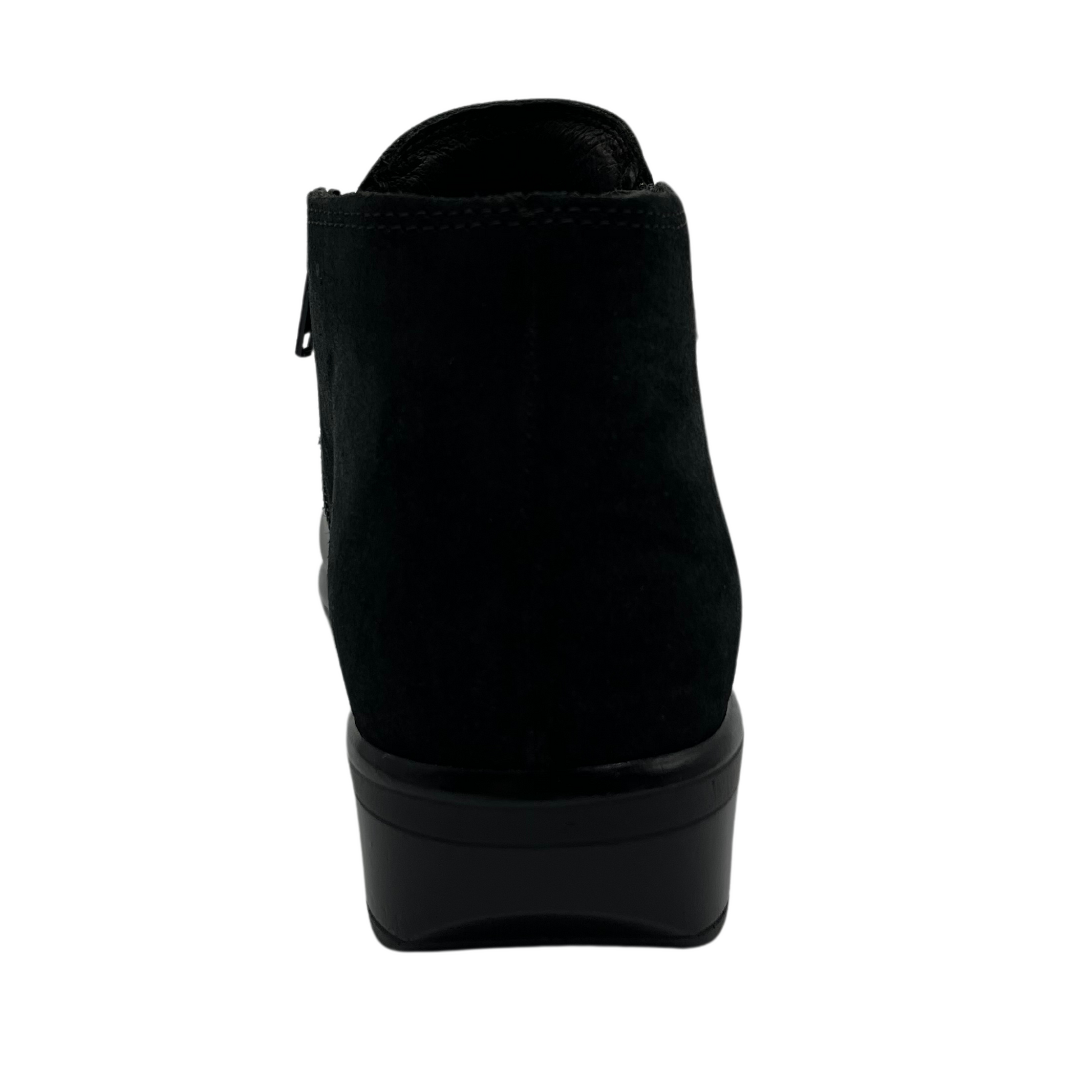 Back view of black leather short boot with black suede back half and double zipper closure