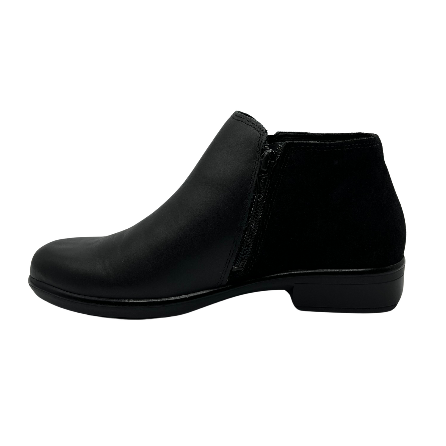 Left facing view of black leather short boot with black suede back half and double zipper closure