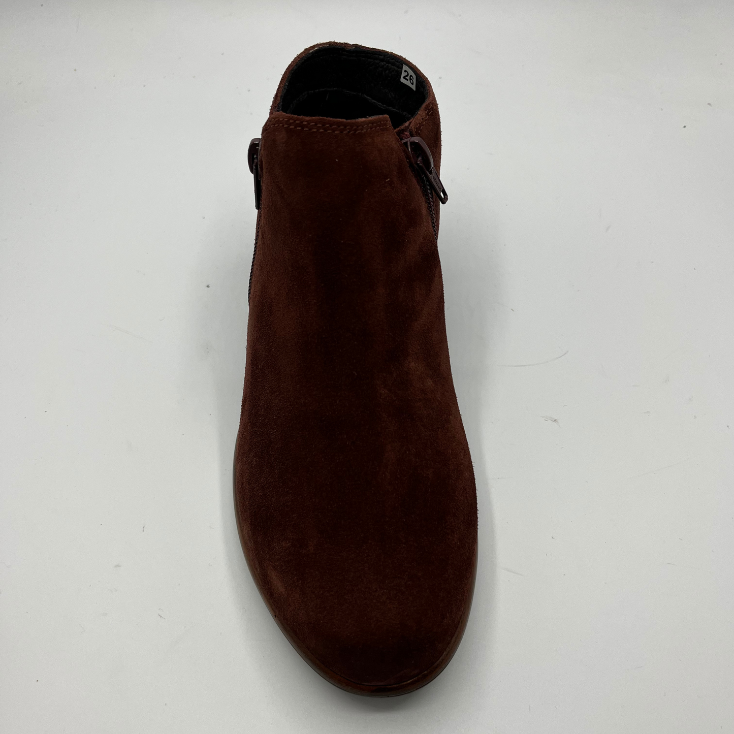 Brown suede ankle boot on a white background