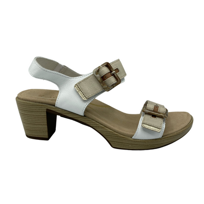 Right facing view of white and tan sandal with chunky heel and buckle straps