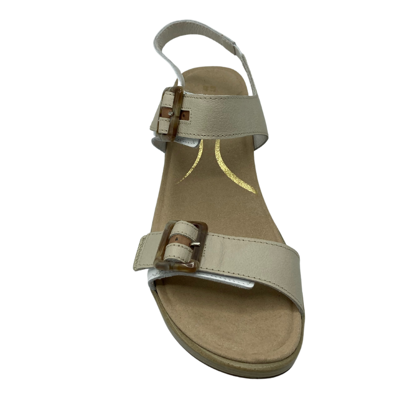Top view of beige and white sandal with buckle straps