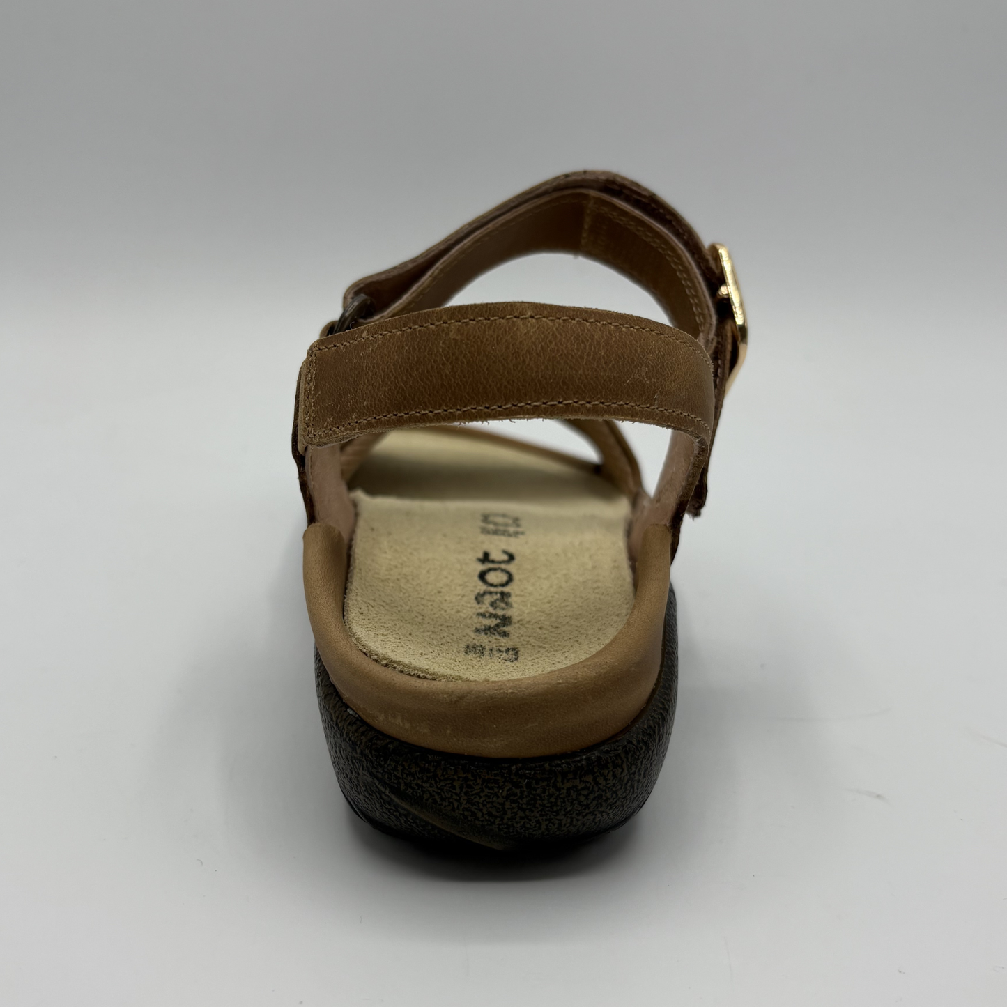 View of a brown adjustable strap sandal
