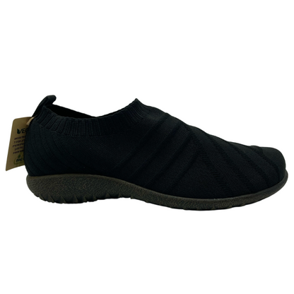 Right facing view of black knit slip on sneaker with polyurethane sole
