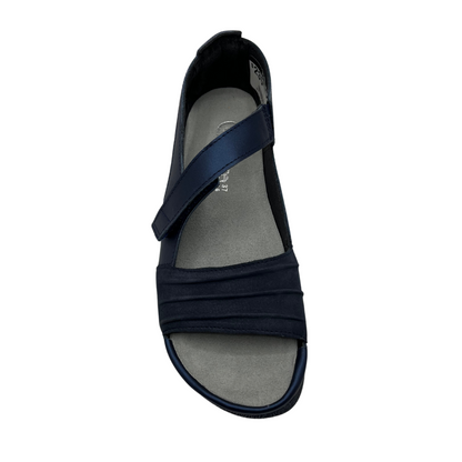 Top view of navy leather sandal with cross over velcro strap and open toe