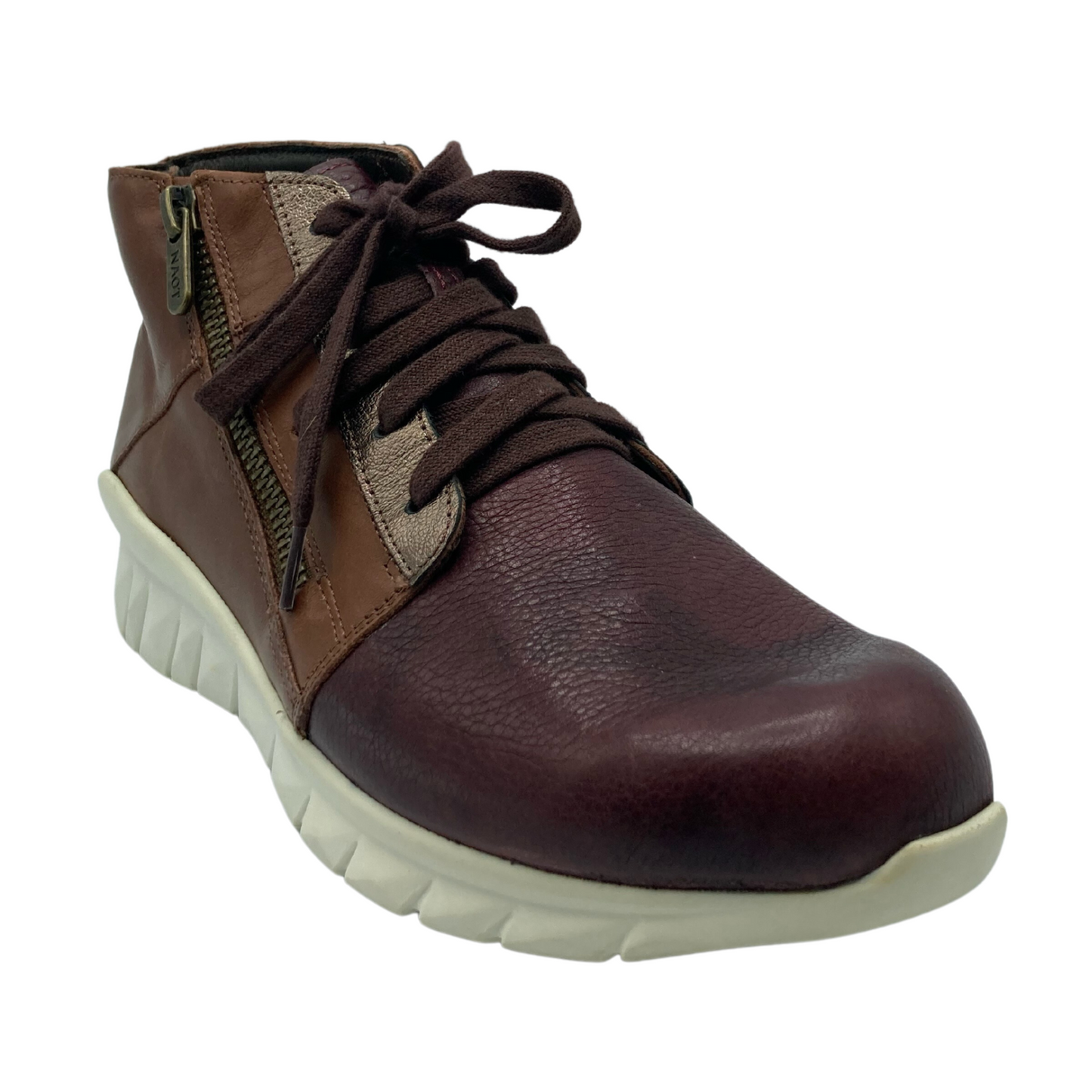 45 degree angled view of brown leather sneaker with brown laces and zipper closure