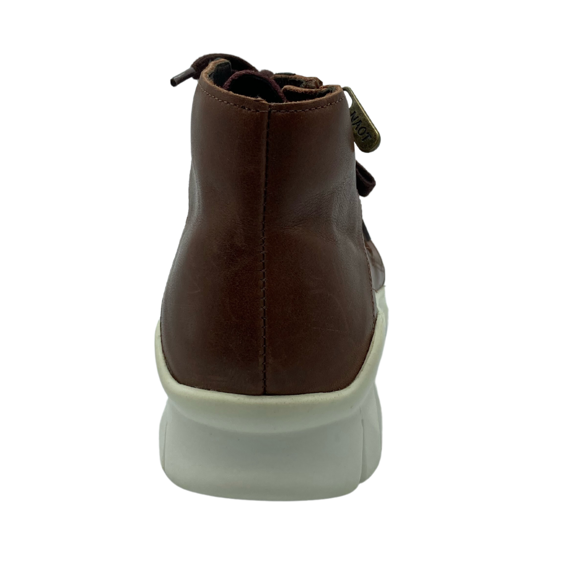 Heel view of back of brown leather sneaker with white sole