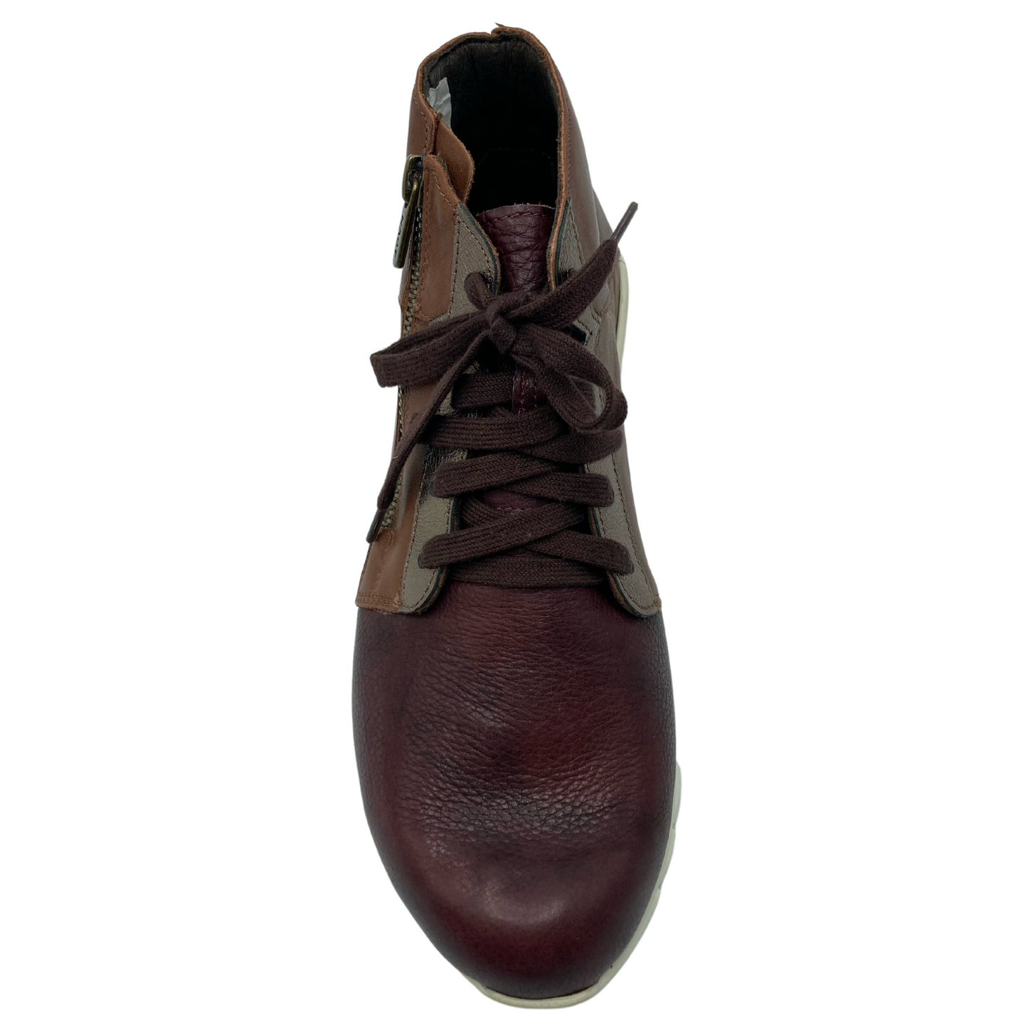 Top view of two-toned, leather sneaker with brown laces