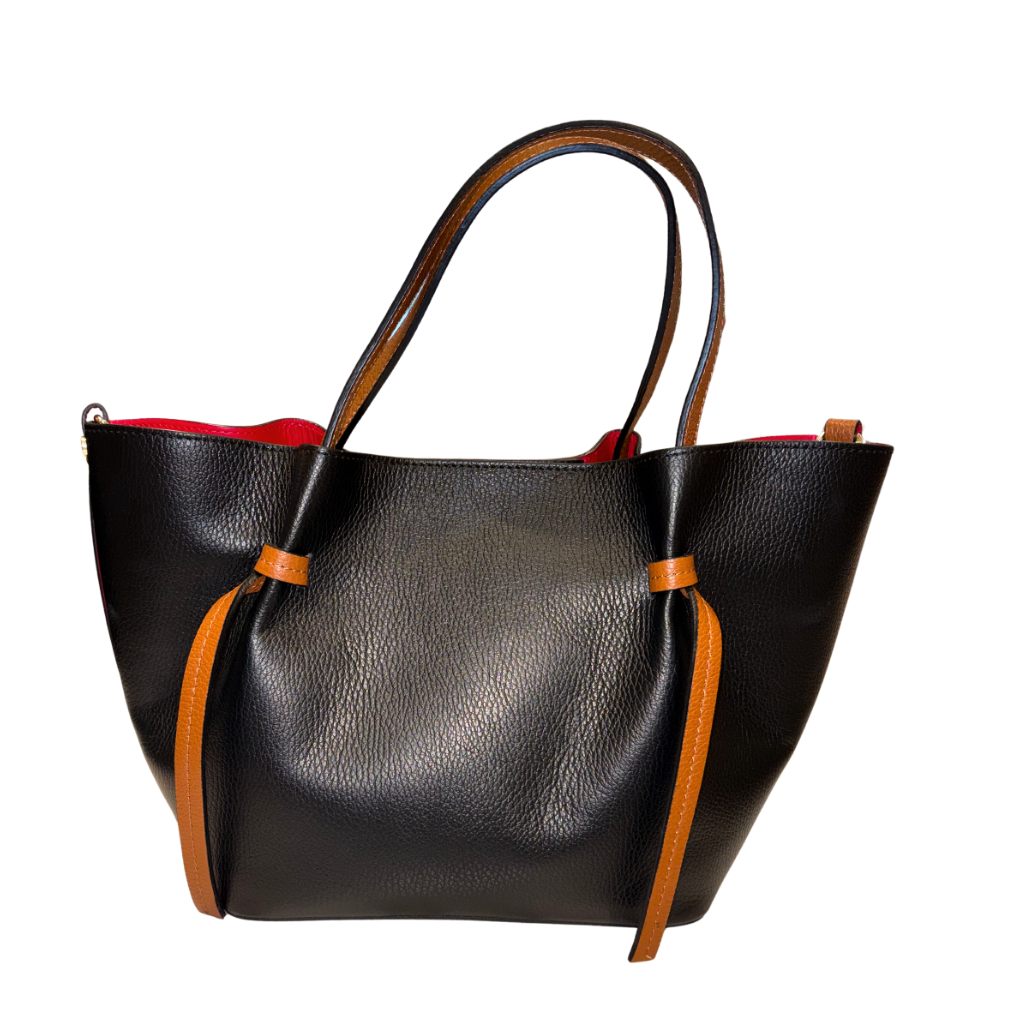 Black leather handbag with brown accents on a white background