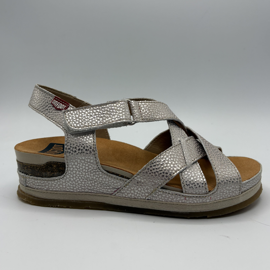 Silver sandal with a textured strap design on a white background